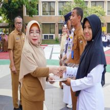 Pj Sekda Kampar Serahkan SK Kenaikan Pangkat ASN Kampar sebanyak 396 Orang